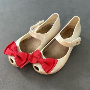 Mini Melissa Cream Kids Shoes with Red Bow
